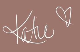 Handwritten Katie signature with a heart