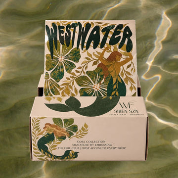 Open Siren SZN box of pre-cut pop-up hair foil with a mermaid print foil standing up, on a green water background
